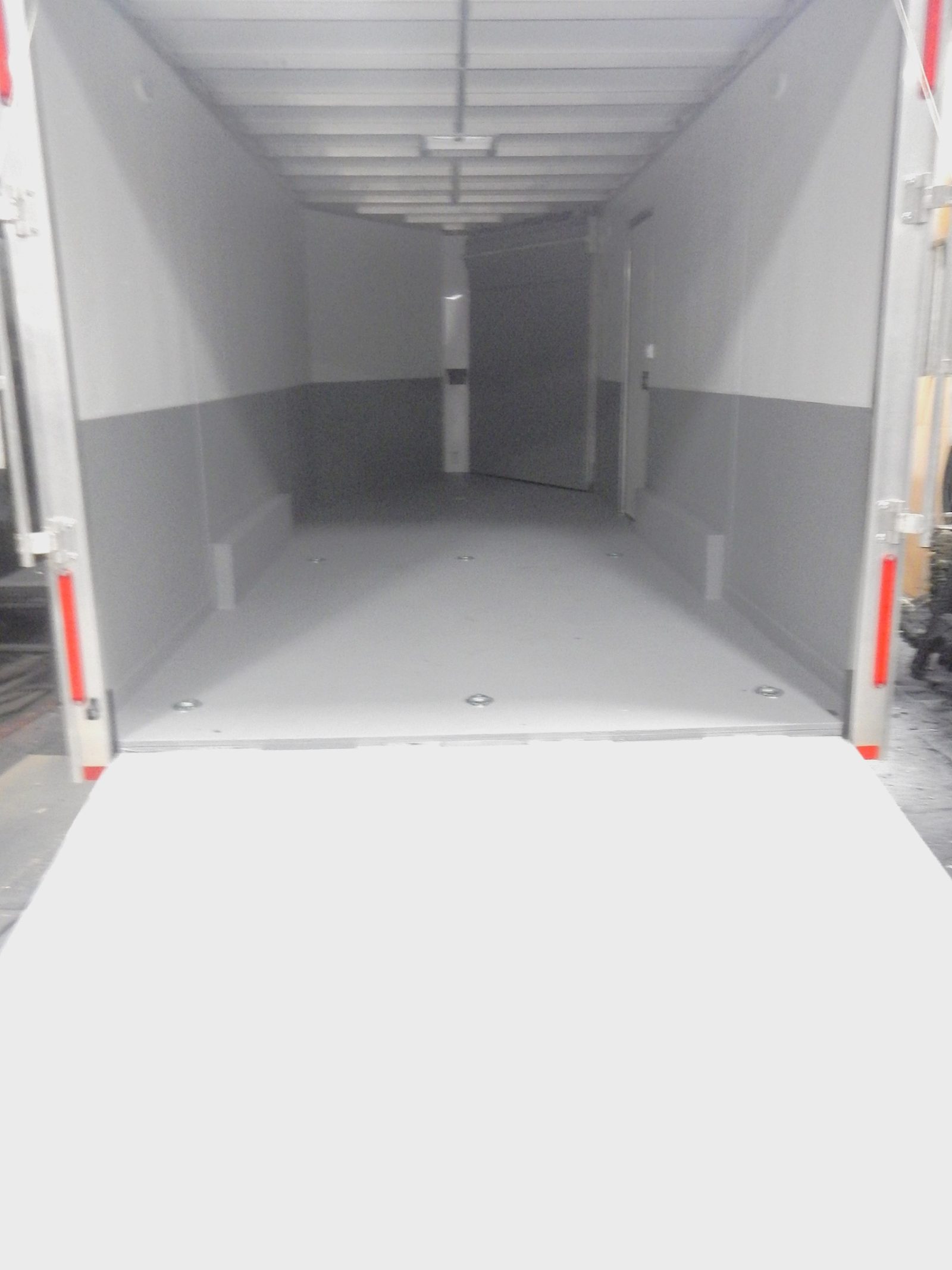 campers, RVs, trailers and mobile homes parked in seasonal winter storage